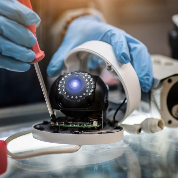 stock-photo-technician-repairs-cctv-camera-on-the-glass-cabinet-1533581822-transformed